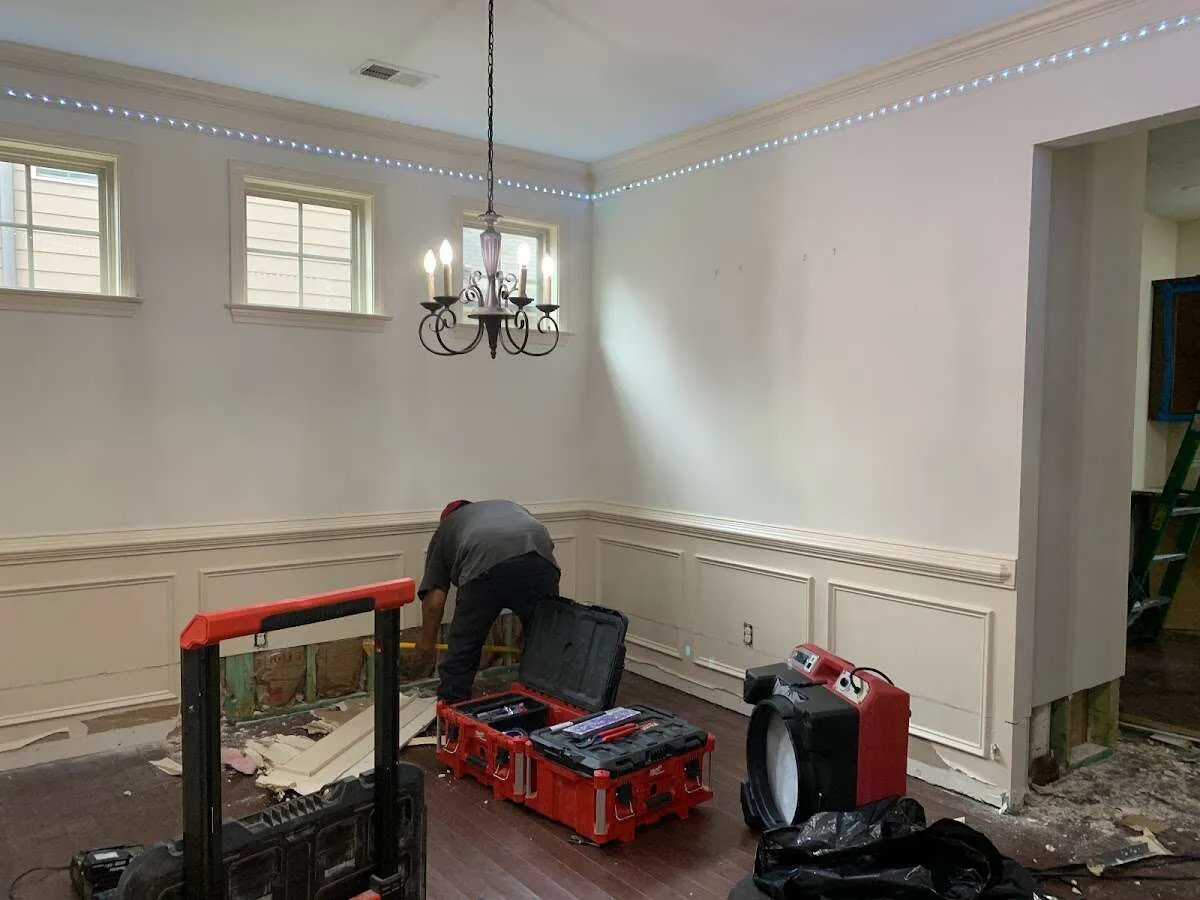 Restoration technician with professional equipment in Eastlake
